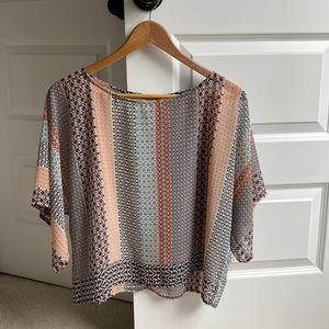 Light, summery, Mediterranean top. Perfect with white or blue jeans/skirts.